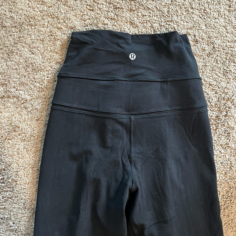 Lululemon Super High Rise Black Leggings with Pockets and Seam Details